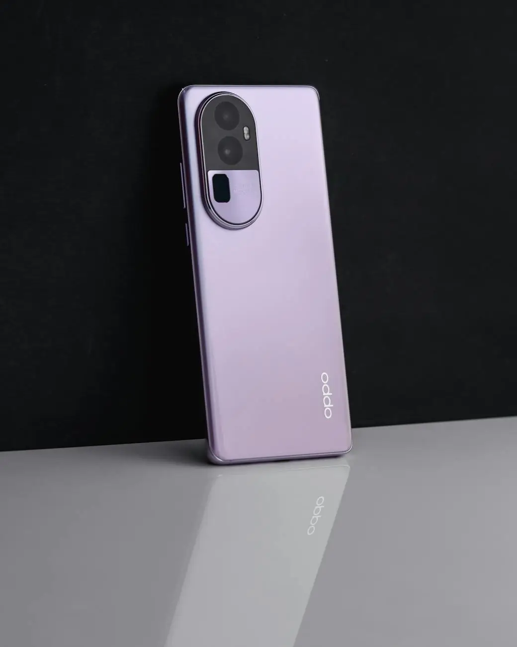 purple smartphone on black background